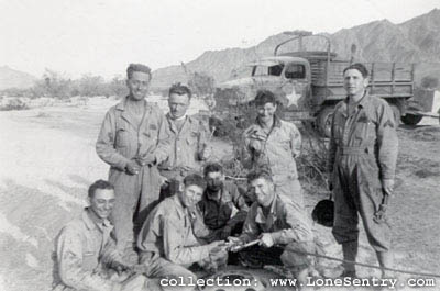 [11th Armored Division Training: Bennet, Wilson C, Stranges, Perry D, Gravens, Hamilton, Helton, Bowlden]